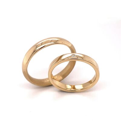 Trauringe aus 750/-Gelbgold mit einem Brillanten, poliert