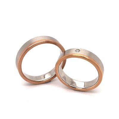 Trauringe aus 750/- Rosé und Weißgold mit einem Brillanten, mattiert
